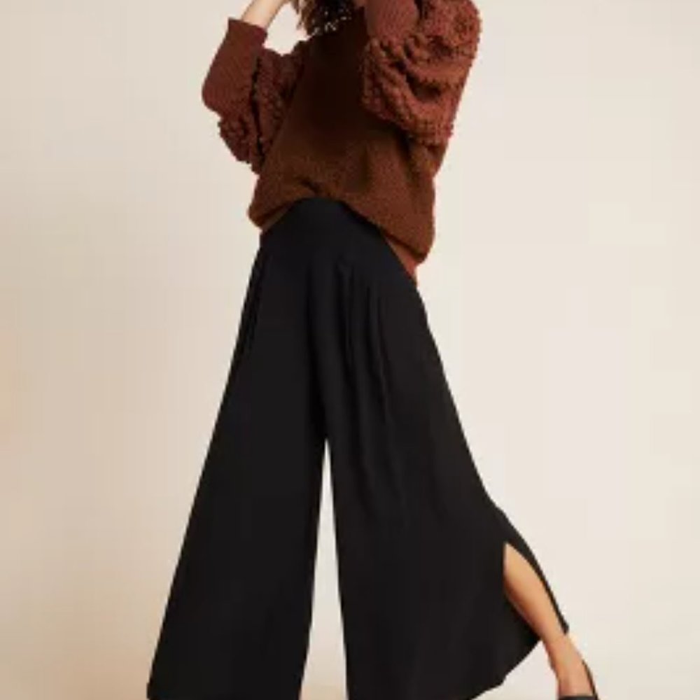 Anthropologie flowy pants with side slits.